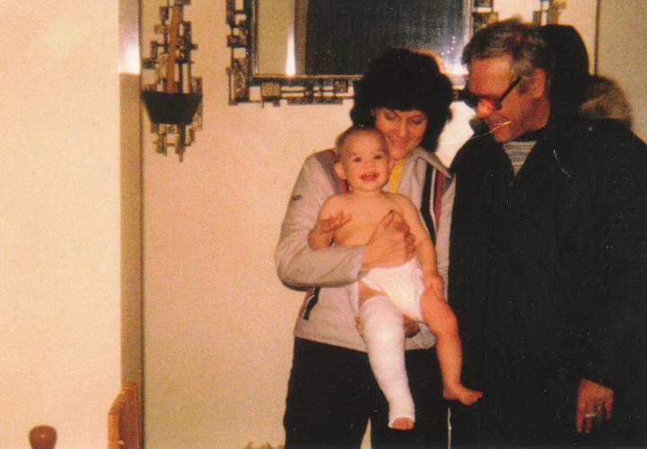 Angie with Nanny and Grandpy at 1 yr old...she broke her leg